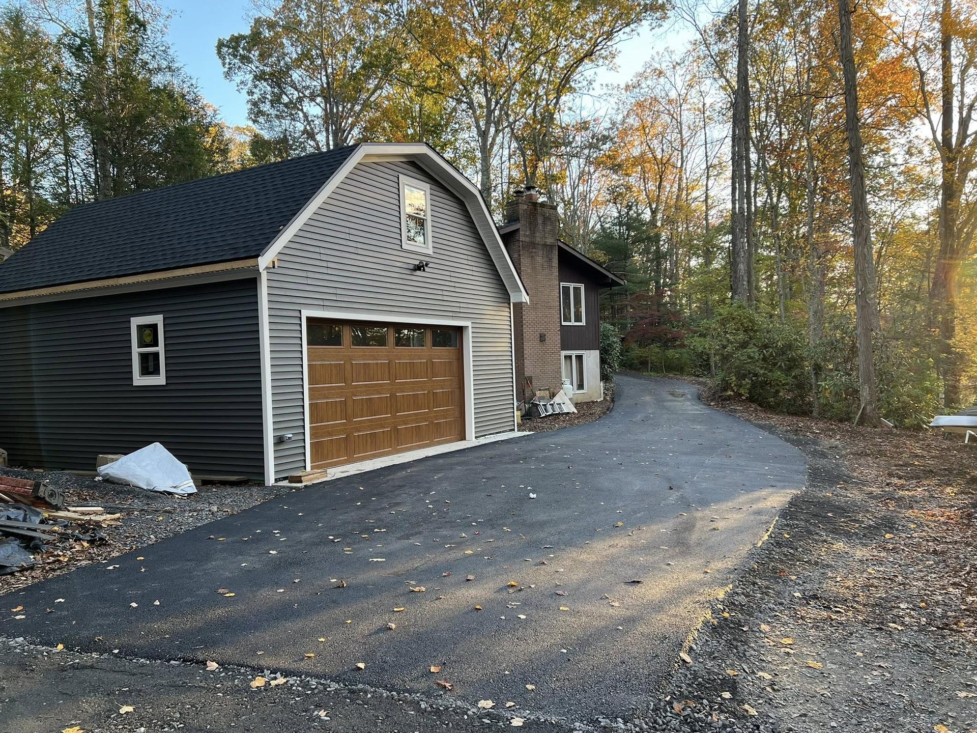 Finished paved driveway with clean curb line